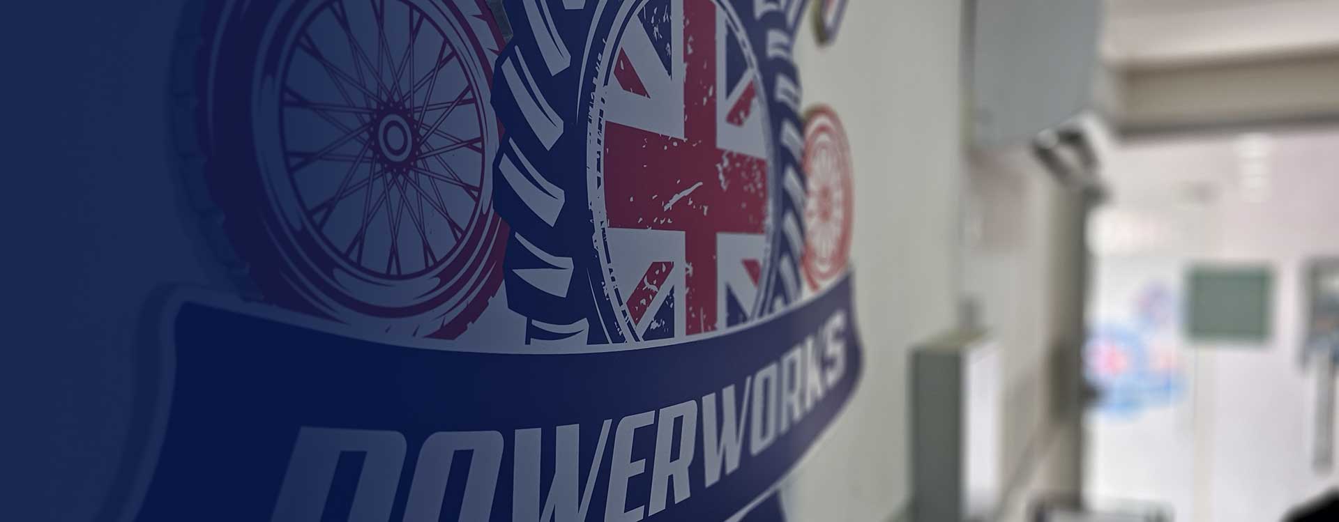 Powerworks Garage branding on the wall of the Dubai Investment Park workshop